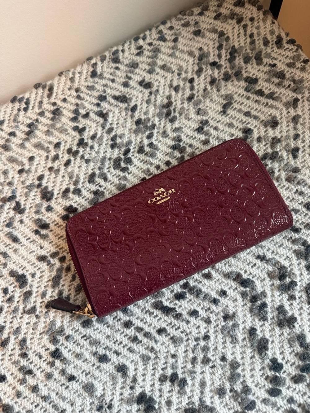 Coach Embossed Zip Wallet in Deep Wine